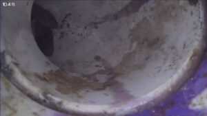 Sewer camera inspection footage inside an older Florida home's drain line