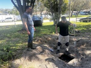 Septic tank riser uncovered in a Palmetto FL yard during a septic inspection
