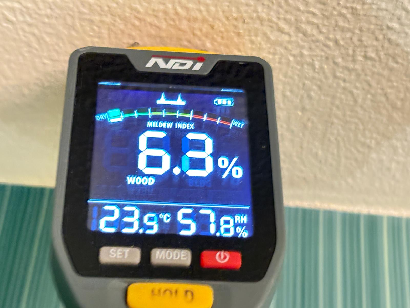 Moisture meter reading taken on an interior wall during a home inspection