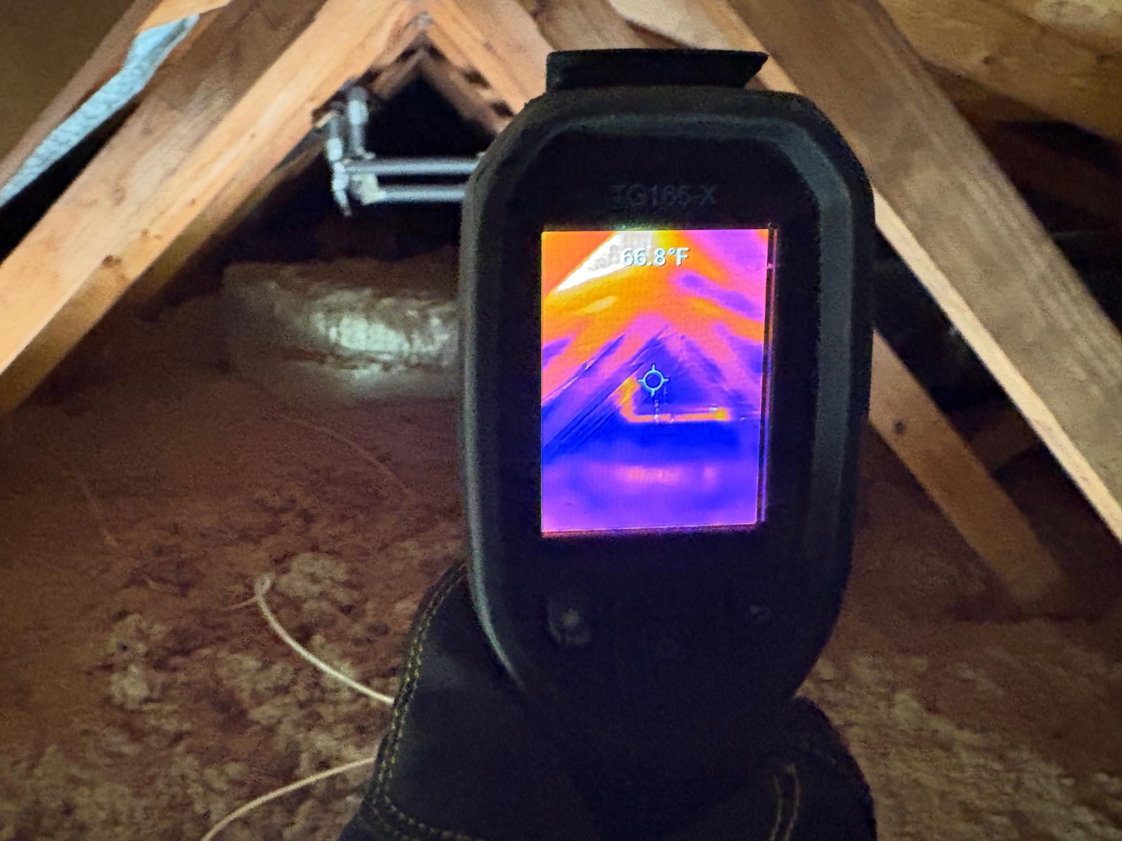 Thermal imaging camera checking an attic during a Florida home inspection